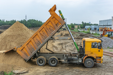 Delivery of sand to the construction site by truck