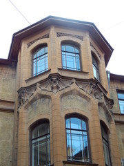 Beautiful tower as a detail of an old house, architectural decoration