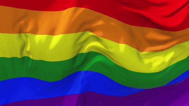 342. Gay Pride Rainbow Flag Waving in Wind Slow Motion Animation . 4K Realistic Fabric Texture Flag Smooth Blowing on a windy day Continuous Seamless Loop Background.