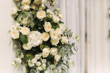 Arch decorated with flowers at the wedding caremony