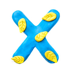 Autumn plasticine letter X of the English alphabet