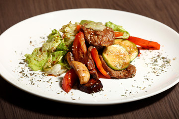 luxury dinner served on the table with glass of red wine