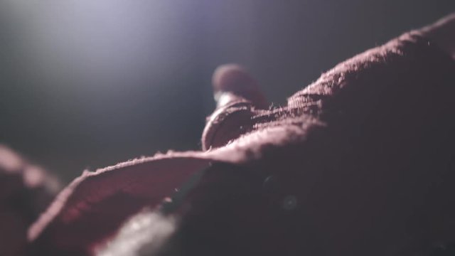 A Brazilian boxer is putting up the bands to protect his hands