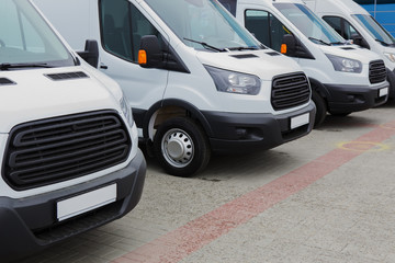 minibuses and vans outside