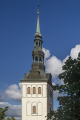 Fototapeta na wymiar The beautiful bell tower of the Church of St. Nicholas in Tallinn, Estonia