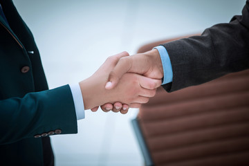 confident handshake business partners. the concept of partnership.