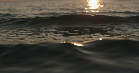 waves at sunset