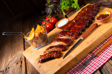 BBQ spare ribs from a charcoal grill