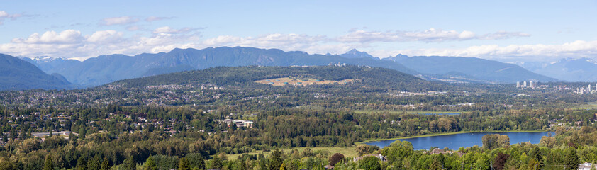 Aerial panoramic view of the modern city during a vibrant summer day. Taken in Burnaby, Greater Vancouver, BC, Canada.