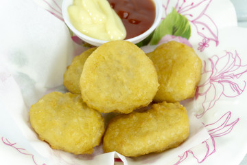 Chicken nuggets in white dish background, props decoration Sauce Tomato and Mayonnaise, Close up.