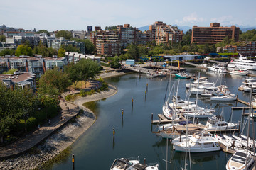 Vancouver, BC, Canada - August 5, 2018: Aerial view of False Creek during a sunny summer day.