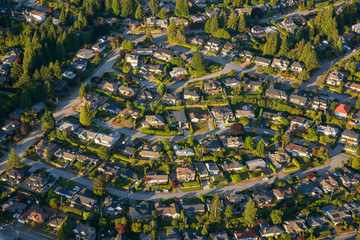 Aerial view of the residential homes during a vibrant sunny summer day. Taken in North Vancouver,...