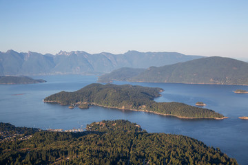 Aerial view of Gibsons, Keats Island and Howe Sound during a vibrant sunny summer day. Located in Sunshine Coast, Northwest of Vancouver, BC, Canada.