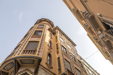 Neomudejar style building viewed from the floor, in Malaga city center.