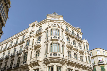 Fototapeta na wymiar Beautiful modernist building from XX century in the city center of Malaga, Spain.
