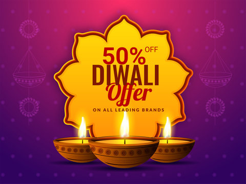 50% discount offer for Diwali festival celebration with illuminated oil lamps on shiny purple background. Sale poster or banner design.