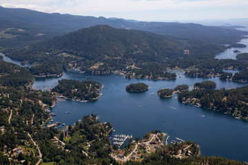 Fototapeta premium Aerial view of Madeira Park during a sunny summer day. Taken in Sunshine Coast, BC, Canada.