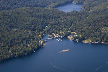 Aerial view of Egmont  during a vibrant sunny summer day. Located in Sunshine Coast, BC, Canada.