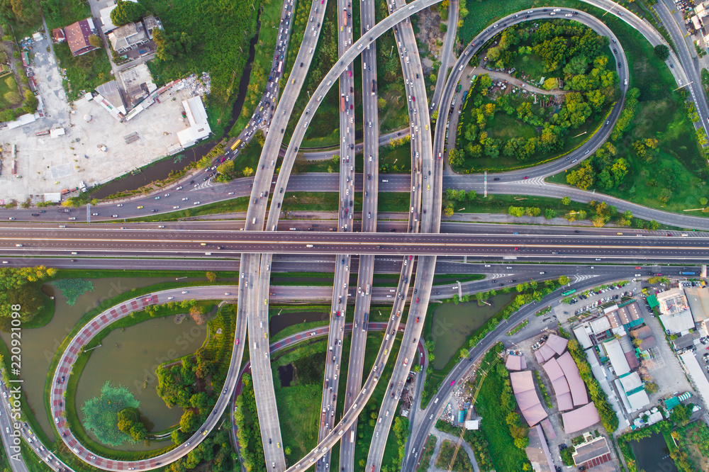 Wall mural city transport junction road aerial view with car movement