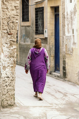 Fototapeta na wymiar Essaouira, Morocco, Old Medina District and Woman in Morocco