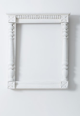 vintage wooden frame on background white wall