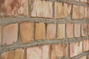 close-up view of old weathered brick wall textured background