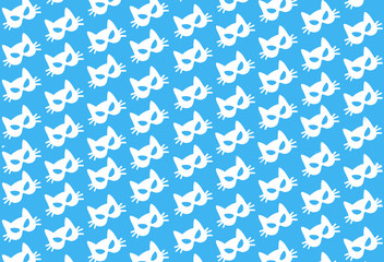 white paper cat mask pattern on blue background. Halloween, carnival, masquerade concept.