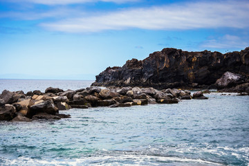 Fototapeta na wymiar Tenerife, Canary islands, Spain - view of the beautiful Atlantic ocean coast with rocks and stones