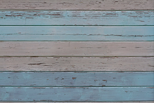 Old colorful (blue and grey) wooden wall as background or texture