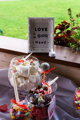 A small table with sweets at the wedding