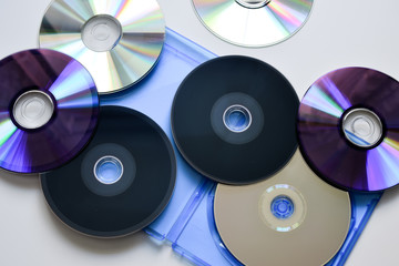 Blu-ray disc in the blue box on white background. Top view