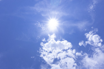 Naklejka na ściany i meble The sky is bright sun shines beautifu blue clouds with copy space for your text..