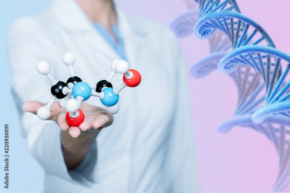 Wall mural close up of molecular structure model in hand on background