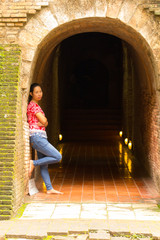 Fototapeta na wymiar Portrait Thai woman at Wat Umong Tunnel in Chiang Mai, Thailand