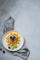 Funny Flower Pancake with berries for kids