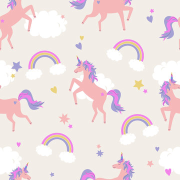 Vector cute seamless pattern with unicorns, rainbows and clouds