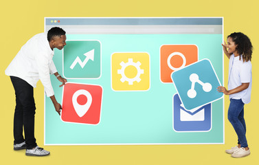 People holding icons  related to internet and technology