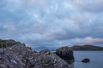 Summer Isles at dusk, taken from the UK mainland, north of Polbain on the west coast of Scotland. 
