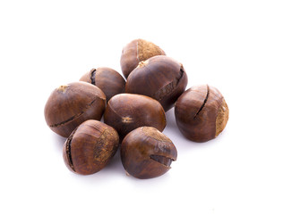 Chestnuts on white background.