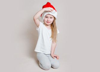 Little girl in santa claus hat