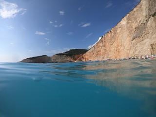 Fototapeta premium Sea level underwater photo of tropical caribbean paradise turquoise beach in exotic island located in an ocean