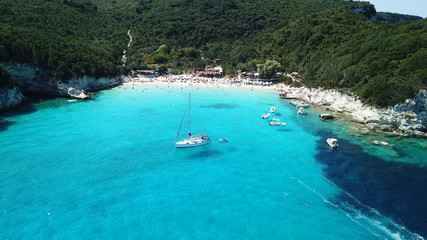 Aerial drone bird's eye view photo of iconic tropical paradise beaches of Voutoumi and Vrika with turquoise clear sea, Antipaxos island, Ionian, Greece