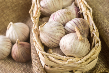 Garlic  in a wicker basket.