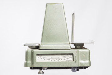 Isolated old weight against a white background.