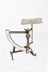 Isolated old weight against a white background.