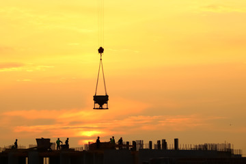 silhouette of construction in the evening on the sunset