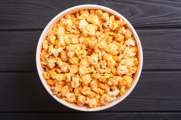 Yellow cheese popcorn in bowl