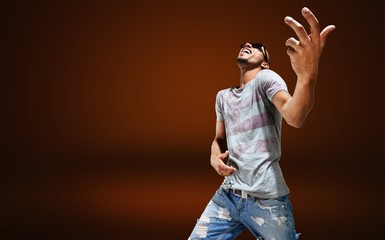 Awesome crazy fashion young man like rock guitar player isolated