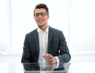 successful businessman sitting at the office Desk