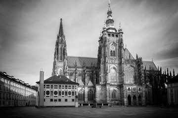 Fototapeta na wymiar Gorgeous St. Vitus Cathedral in Prague Castle architectural complex in the historic part of Prague, black and white cityscape, Czech Republic, travel Europe 